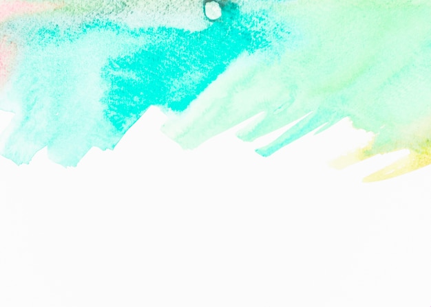 Abstract turquoise watercolor on white background