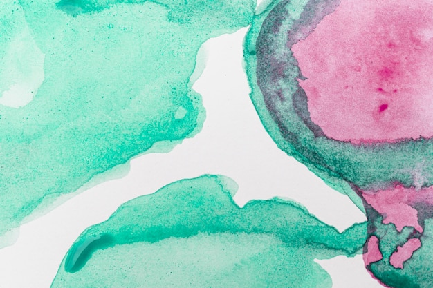 Abstract watercolor pink and green background
