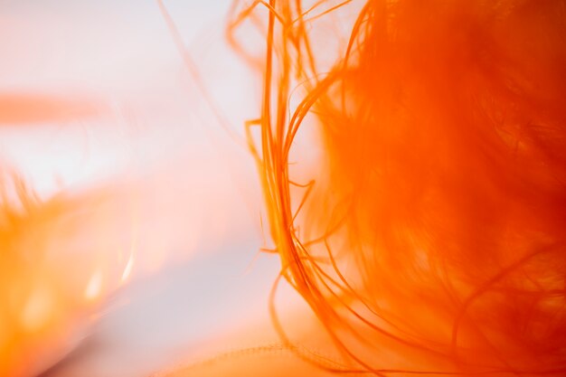 Abstract waving orange fibers 