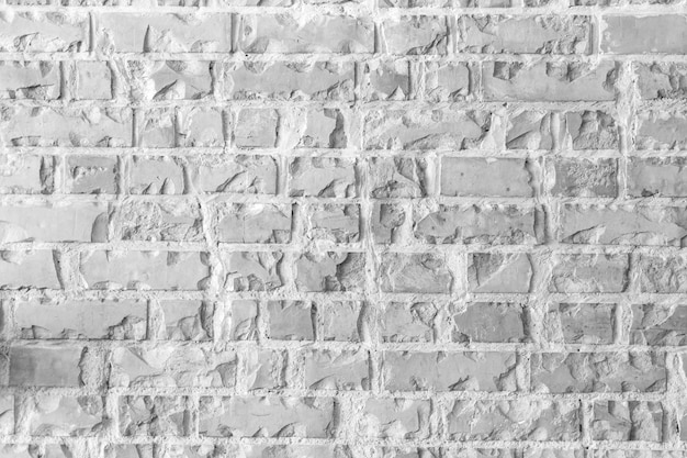 Abstract weathered texture white brick wall background