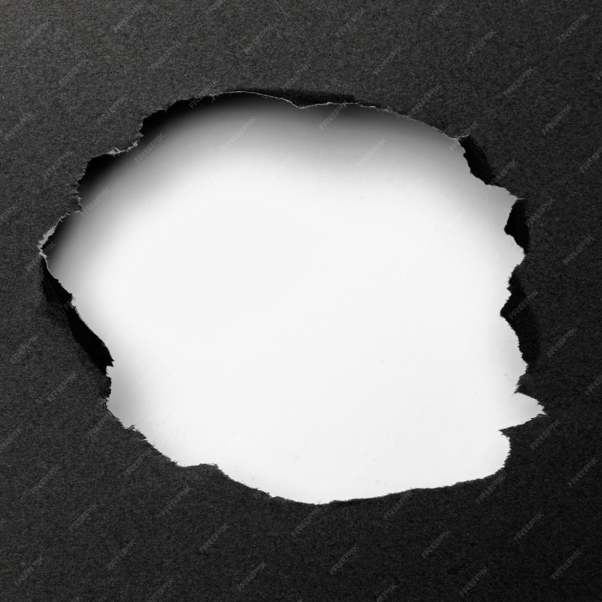 Free Photo | Abstract white cutout shape on black background