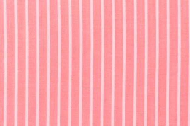 Abstract white stripes pattern on red textile background