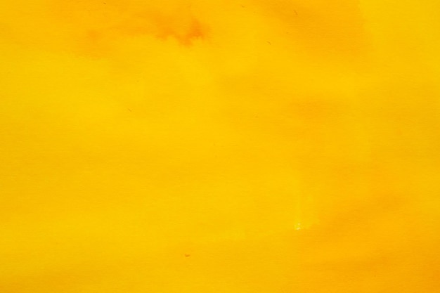 抽象的​な​黄色​の​水彩​背景​の​テクスチャ