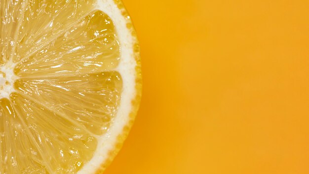 Acid slice of lemon with close-up