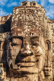 Acient castle face of bayon in ankor thom cambodia