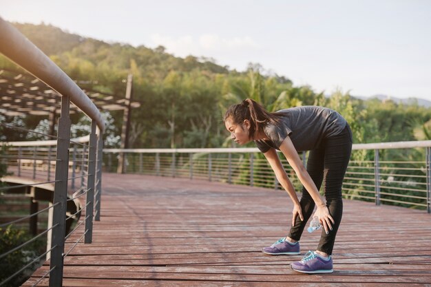 Active girl stretching her body