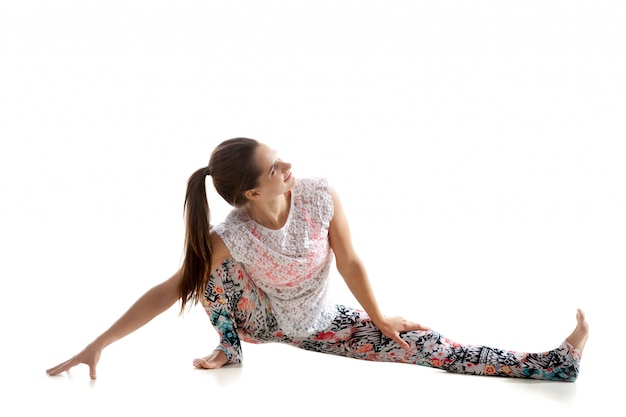 Free photo active sportswoman stretching and looking up