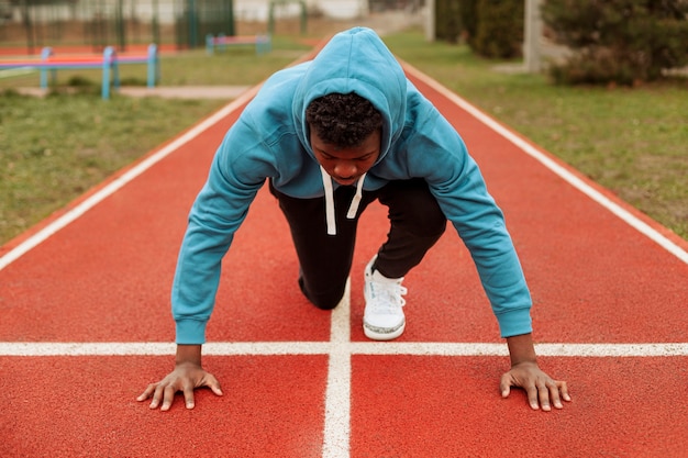 Free photo active teenager jogging outdoors