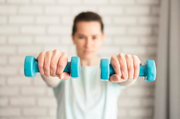 Active woman working out at home