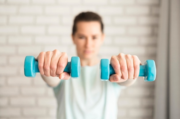 Active woman working out at home