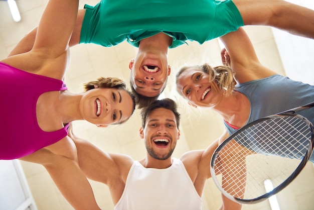 Active young people playing squash