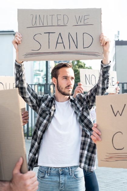 Activist standing together with protesters