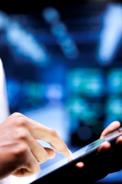 Engineer Writing Data Center Disaster Contingency Plan on Tablet (Free Download)