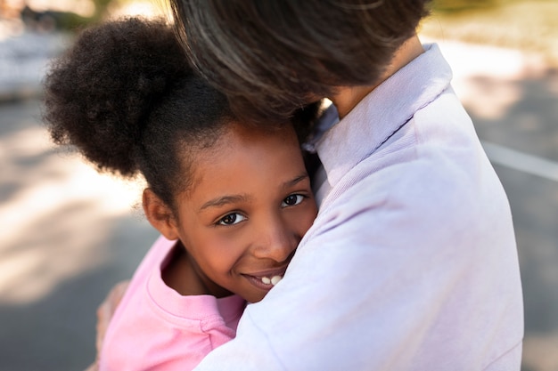 Adoptive mother spending time with her daughter