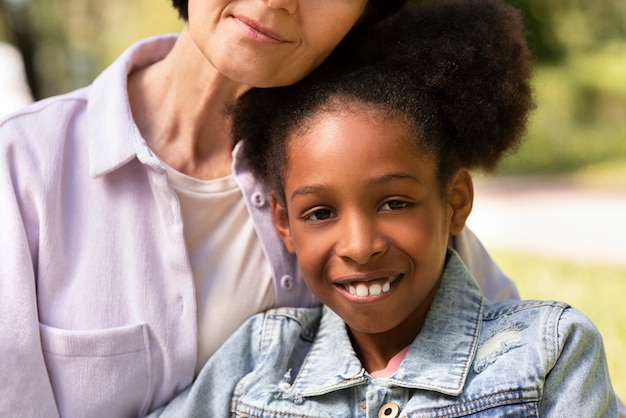 Free photo adoptive mother spending time with her daughter