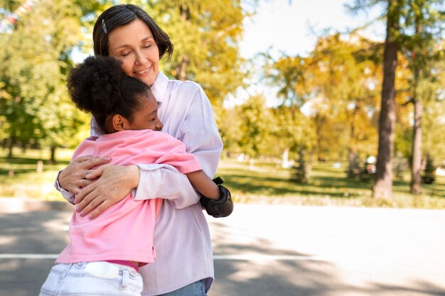 Adoptive mother spending time with her daughter