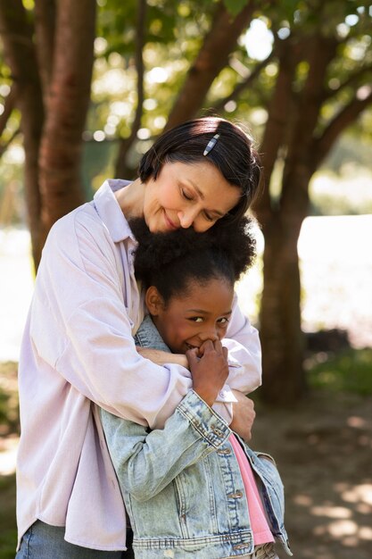 Adoptive mother spending time with her daughter