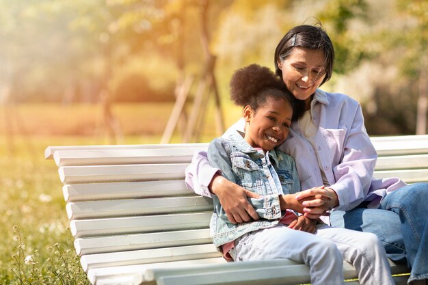 Free photo adoptive mother spending time with her daughter