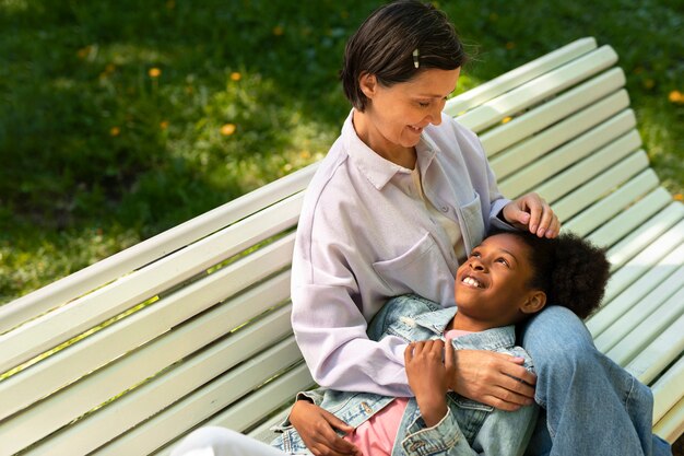 Adoptive mother spending time with her daughter