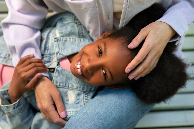 Adoptive mother spending time with her daughter