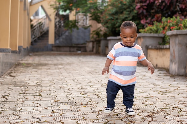 Adorable african black little boy