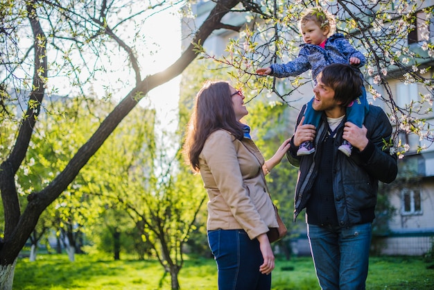 Free photo adorable child with his parents