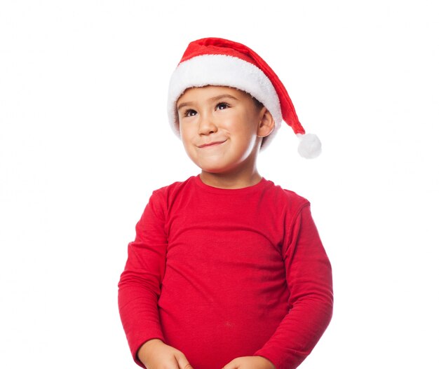 Adorable child with santa claus hat