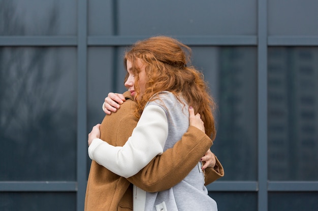 Adorable couple hugging each other