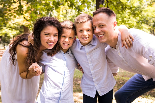 Adorable family spending time in the park 