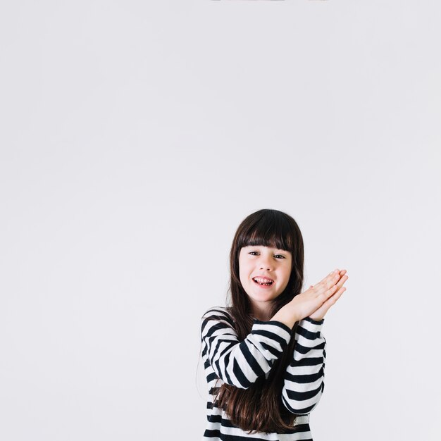 Free photo adorable girl clapping hands