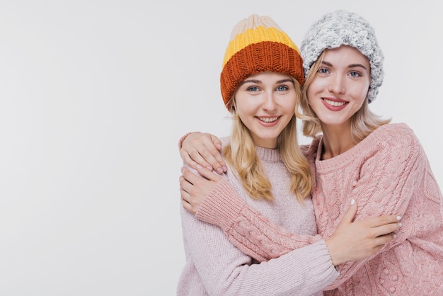 Adorable girls hugging each other