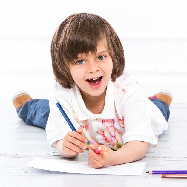 Adorable kid on the floor