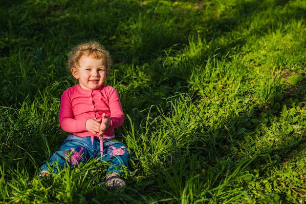 Adorable kid laughing in the park