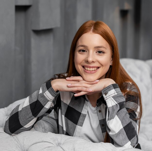 Adorable lady posing indoors medium shot