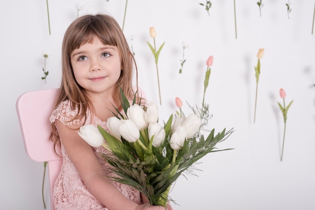 Adorable little girl looking away