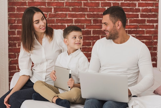 Adorable parents and son together