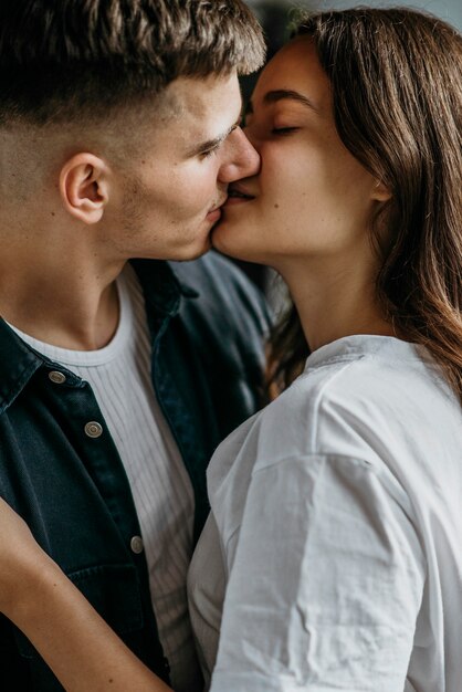 Adorable young couple kissing