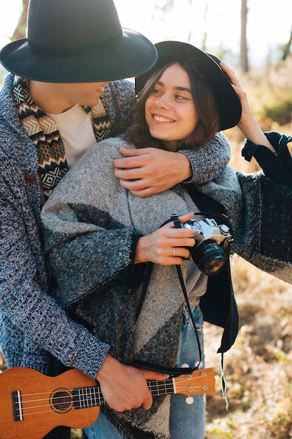 Adorable young couple in the nature