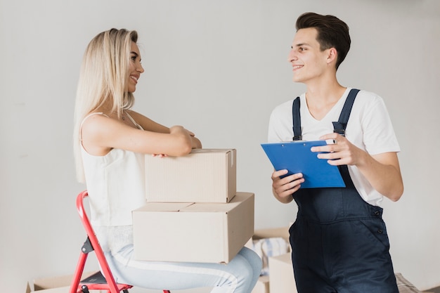 Adorable young couple ready to move