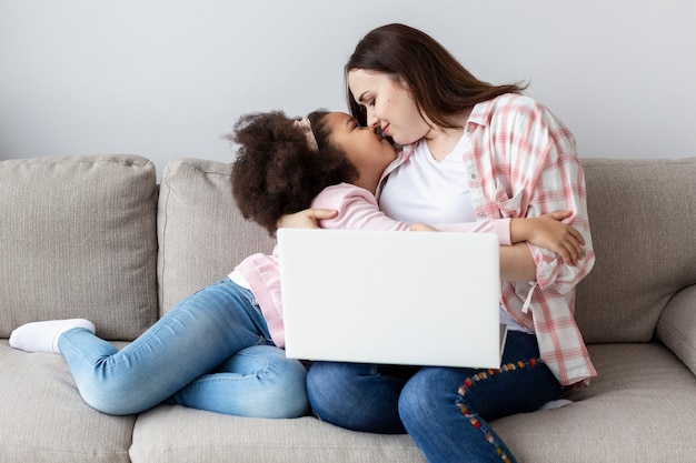 Adorable young girl happy to be home with her mother