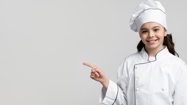 Adorable young girl smiling with copy space