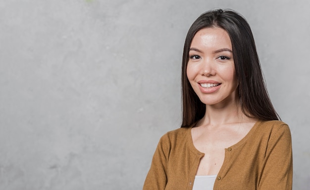 Free photo adorable young woman smiling