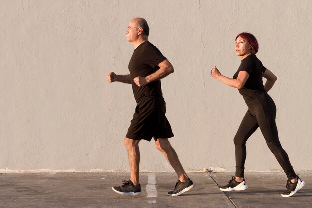 Adult couple doing sport and running