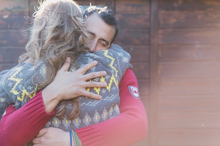 Free Photo adult couple embracing at wall