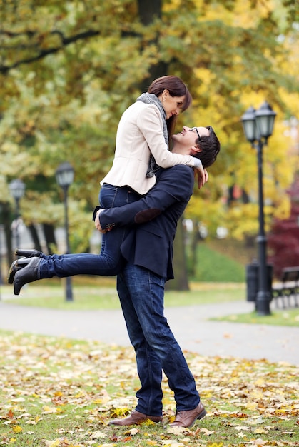 Adult couple having a good family day in the park