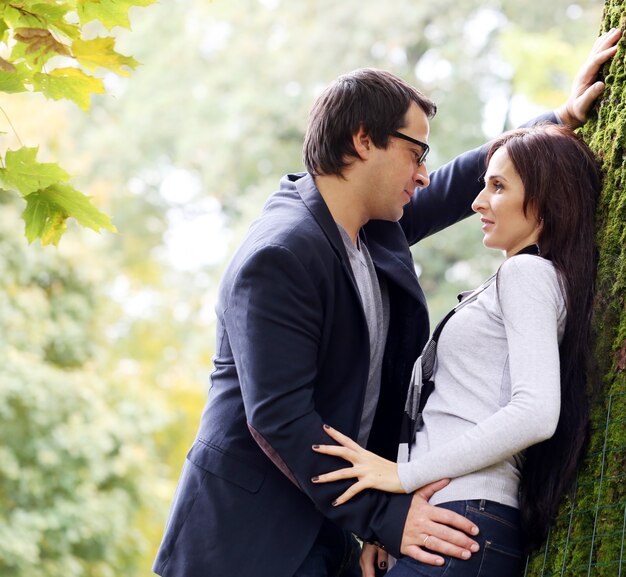 Adult couple having a good family day in the park