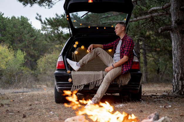 Adult male enjoying bonfire