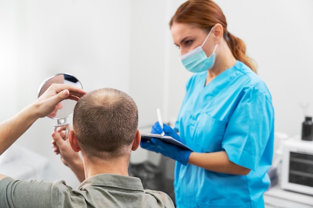 Free photo adult male having balding problems