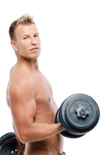 Adult man without shirt posing in studio