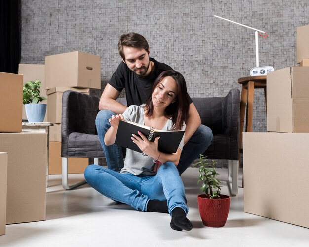 Adult man and woman getting ready to move